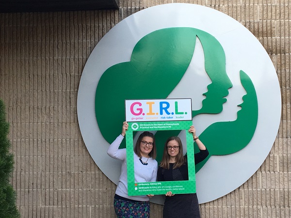 Katherine Garland (right) poses with her co-worker Lyndsey Mackie outside the Girl Scouts in the Heart of Pennsylvania office. 